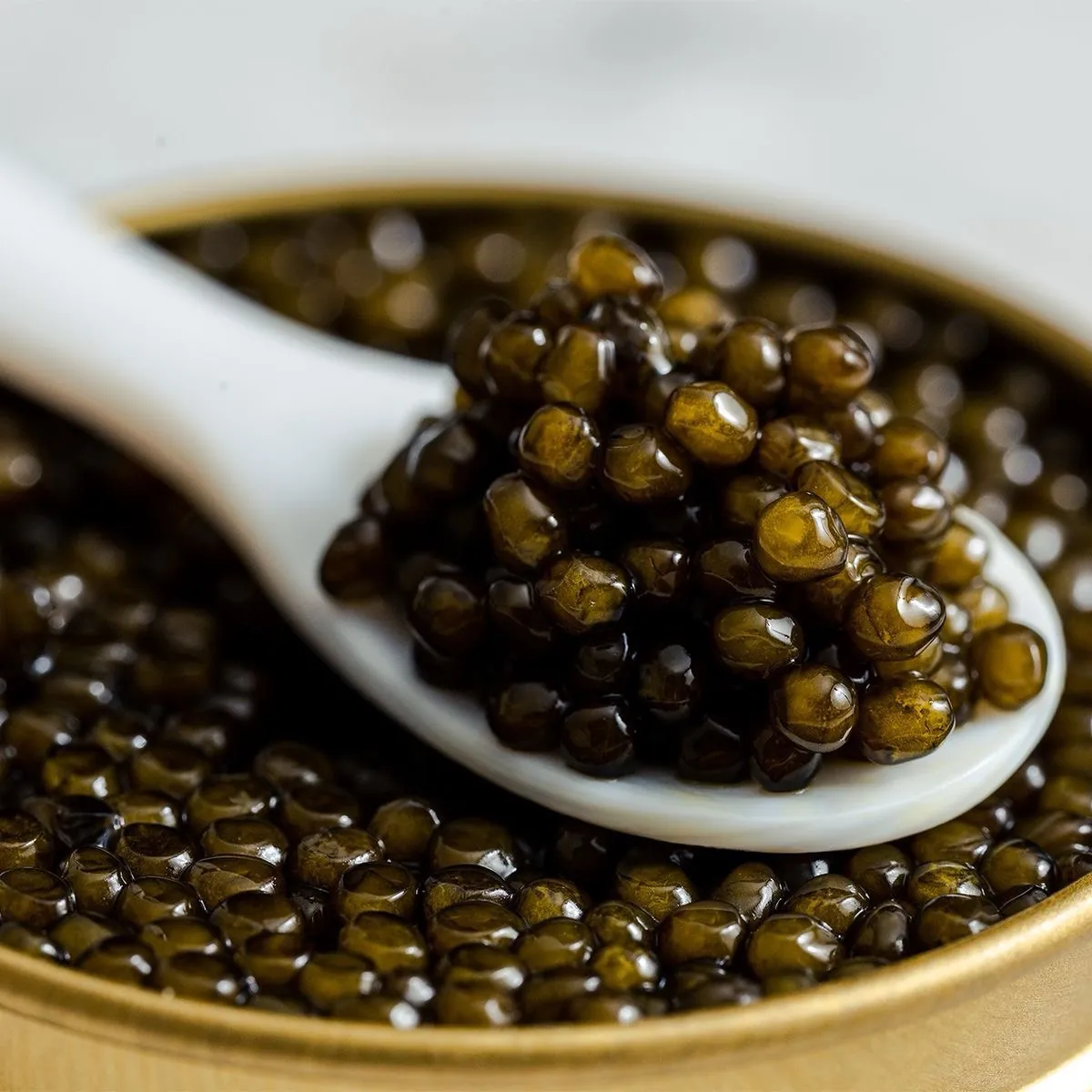 Caviar served with a mother-of-pearl spoon