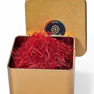 Open gold tin filled with 10 g of Super Negin saffron threads
